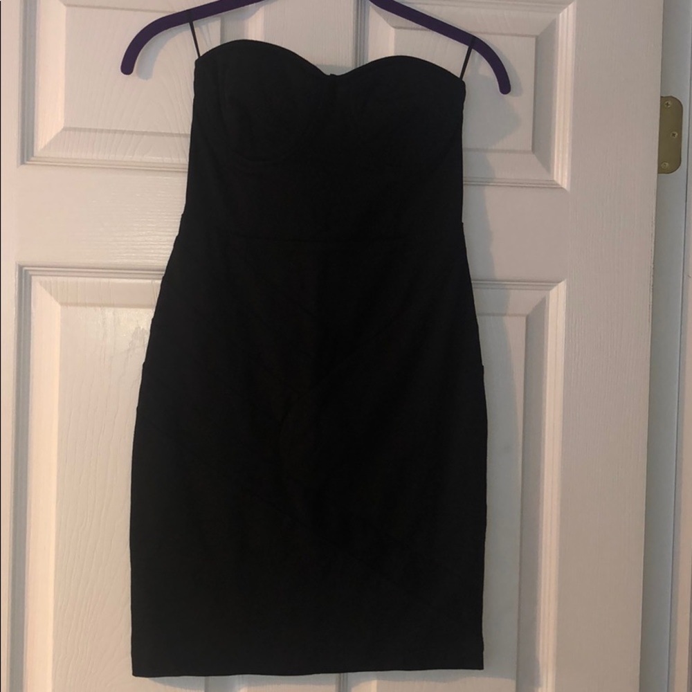 Little black strapless dress with bandage pattern